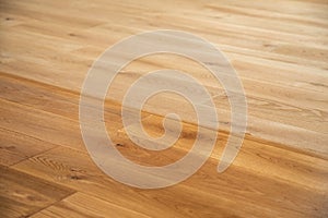 Comparison of luxury oak parquet flooring before and after application of oil-based floor finish