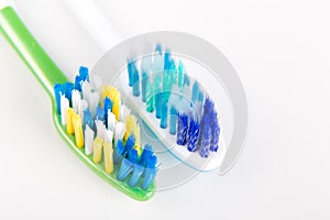 Comparison of toothbrush with round tip bristle and tapered bri