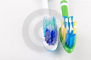 Comparison of toothbrush with round tip bristle and tapered bri