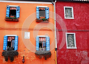 A comparison of two houses in Burano Venice area Italy