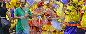 Comparsa group at street, calls parade montevideo, uruguay