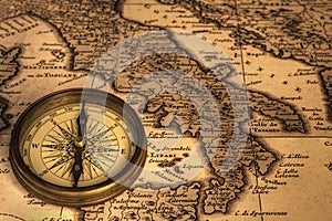 Compass and Ancient Map of Italy