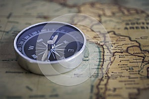 Compass on the background, old world map, vintage style, geo-navigation concept