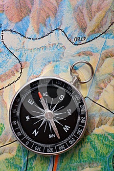 Compass on geography map