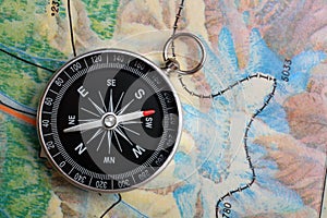 Compass on geography map