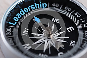 Compass indicating leadership photo