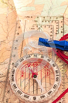 Compass on Map and Rescue Whistle