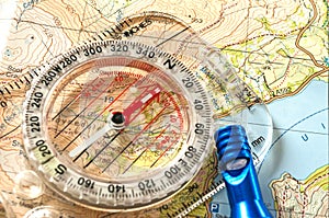 Compass on Map and Rescue Whistle