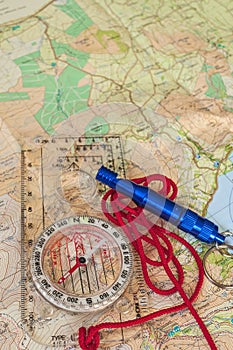 Compass on Map and Rescue Whistle