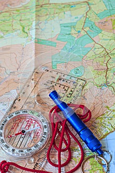 Compass on Map and Rescue Whistle