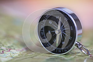 Compass on map. Travel and adventure Concept.