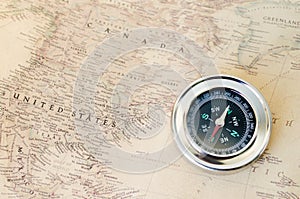 Compass on the old map