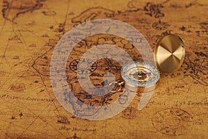 compass on old map - Explore the world-travel concept