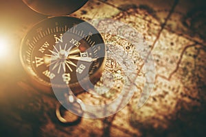 Compass and Paper Map Navigation Tools Closeup