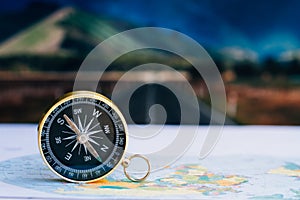 compass on paper map, travel and lifestyle, manage to success business technology concept