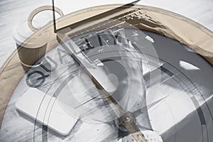 Composite image of compass pointing to quality