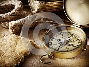 Compass, rope and book