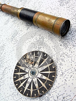 Compass rose and binoculars on map