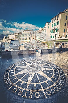 Compass rose. Windrose mosaic on the road in Camogli, Italian city photo