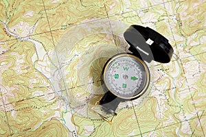 Compass on a topographical map photo
