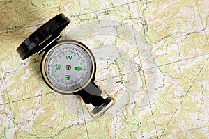 Compass on a topographical map photo