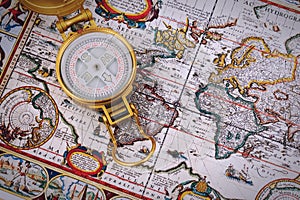 Compass on vintage map.
