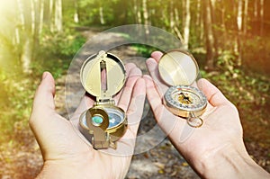 Compasses in the hands