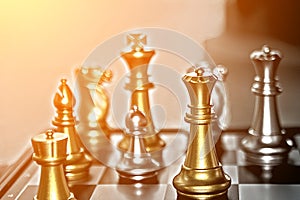 Competition in business, chess pieces and bright concept photo w