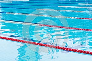 competition pool with blue water and marked swimming lanes