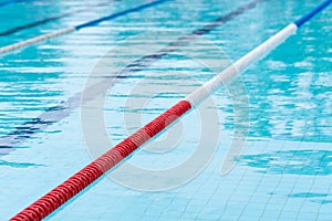 competition pool with blue water and marked swimming lanes