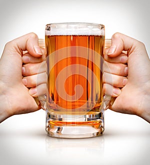 Competition of two hands with beer in glass