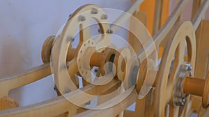 Competition of two same size wooden wheels with different weight