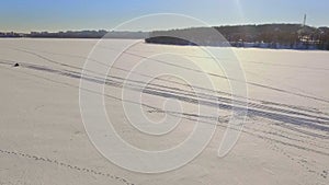 Competitions of paraglider pilots on the frozen lake. Ternopil Ukraine