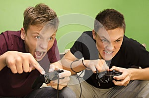 Competitive brothers playing video games funny photo