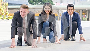 competitive business people in smart suite and cloth sit and prepare to start for running like athletic at outdoor pedestrian