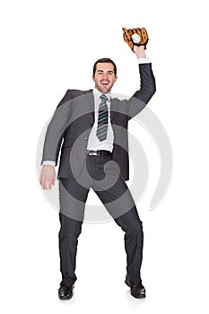 Competitive businessman with baseball glove