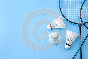 Competitive sports and high performance in tournament match conceptual idea with badminton rackets and shuttlecock birdie