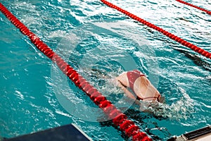 competitive swimming in the pool during training