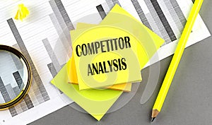 COMPETITOR ANALYSIS text on sticky on sticky on chart with pen