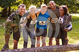 Competitors celebrate completing an extreme endurance event photo