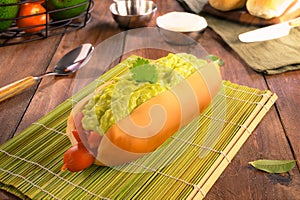 Complete Chilean Italian - Traditional Chilean Sandwich - Bread, Sausage, tomato and onion vinaigrette, palta and mayonnaise photo