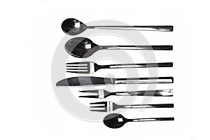 complete cutlery set knives forks spoons isolated