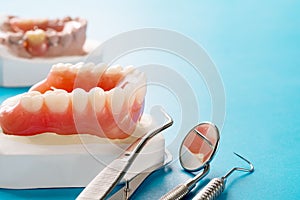 Complete denture or full denture.