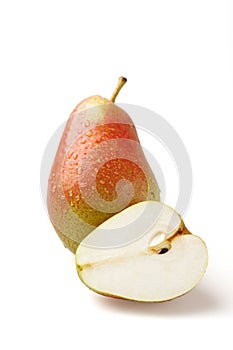 Complete and half a pear on a white background