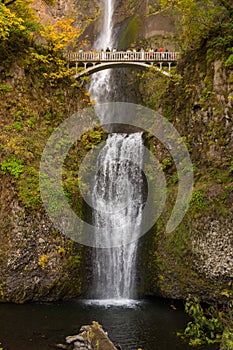 Complete view of both tiers of the Multnomah waterfall and the bridge between them located in the Columbia River Gorge