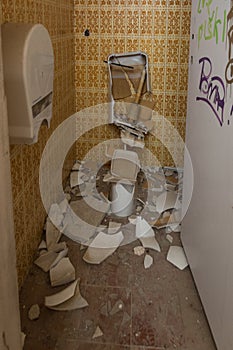 completely broken ceramic toilet