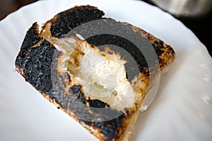 Completely burnt rice on plate