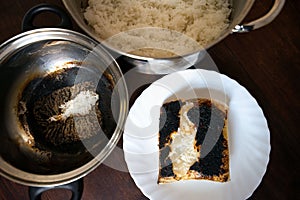 Completely burnt rice on plate