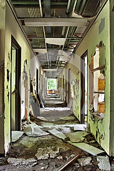 Completely destroyed hallway in abandoned building