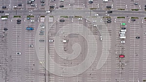 Completely empty car parking near a shopping center during a pandemic. top view